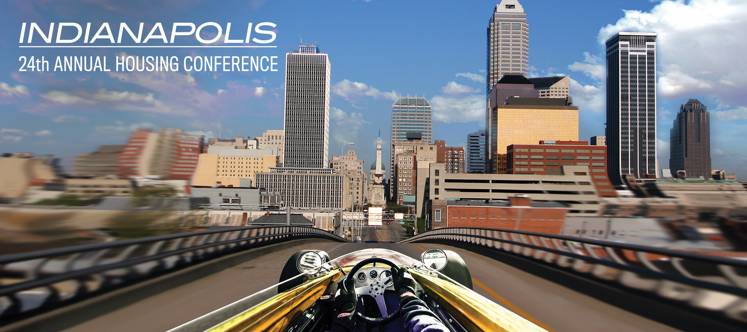 Image of conference banner, a race car in Downtown Indianapolis